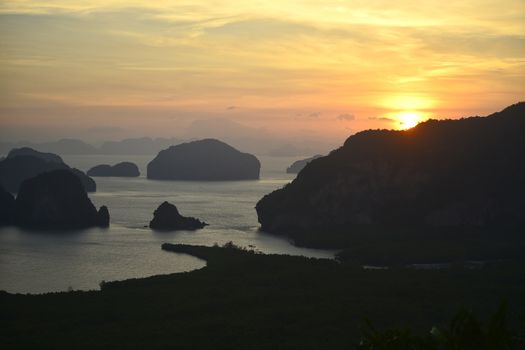 Beautiful view at sunrise time at Samed Nang Chee mountain view point in Phang Nga Province,thailand