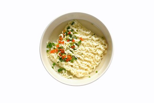 round instant noodle (Thai mama noodles instant food) in hot water in bowl cooked the ingredients Isolated on white background. Top view