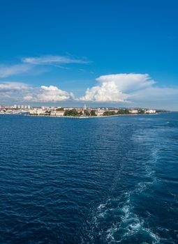 Wake behind departing cruise ship leaving the port of Zadar in Croatia