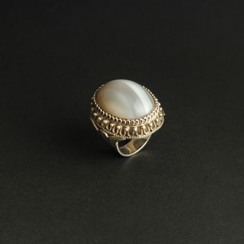 ancient antique ring with stones on black background. Middle-Asian vintage jewelry