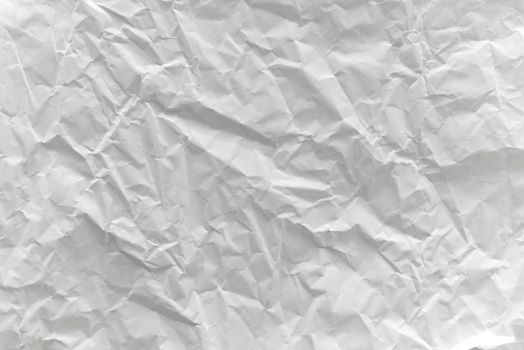 Wrinkled creases on white paper or White crumpled paper texture background.