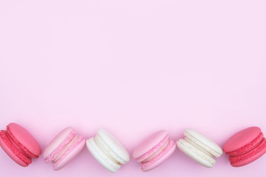 macarons on pink background, Beautiful dessert, Flat lay style with copy space to write.