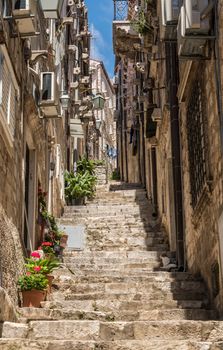 Steep steps in narrow street in the old town of Dubrovnik in Croatia