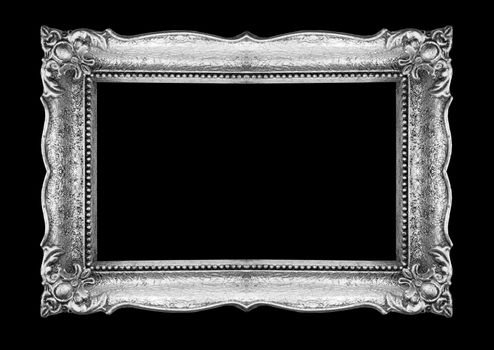 Old Picture Frame on black wall, silver metal