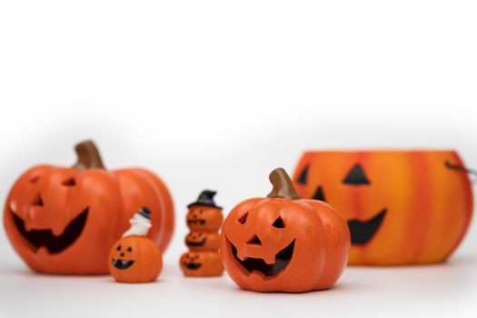 Halloween pumpkin on grey background. Halloween idea concept.