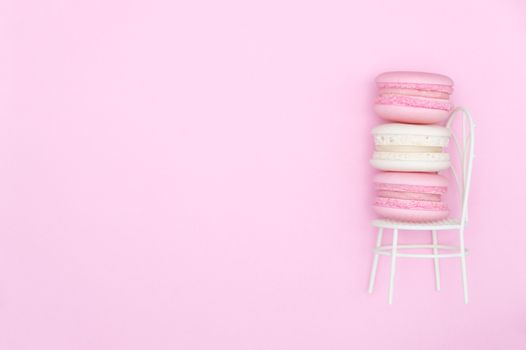 macarons on pink background, Beautiful dessert, Flat lay style with copy space to write.