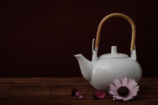 Still life the teapot on rustic wooden table, Choose a focal point, copy space for write.