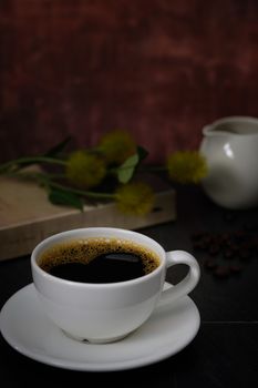 Classic still life with a cup of coffee with copy space, verticle picture.