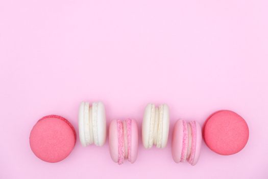 macarons on pink background, Beautiful dessert, Flat lay style with copy space to write.