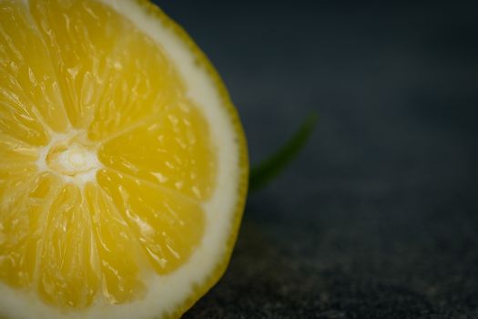 Close up with lemons on rustic low key background, Choose focal point, dark light style.