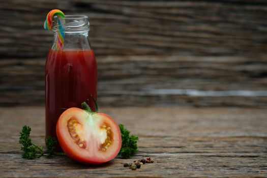Still life of fresh ripe tomatoes juice on wooden background, Choose focus point. Good health concept.