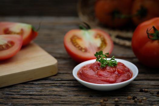 Still life of fresh ripe tomatoes sauce on wooden background, Choose focus point. Good health concept.