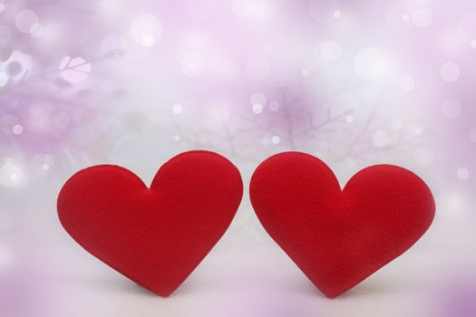 The red Heart shapes on abstract bokeh background in love concept for valentines day with romantic moment.