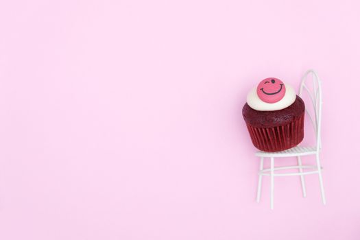 Red velvet cupcake on pink background, Beautiful dessert, Flat lay style with copy space to write.