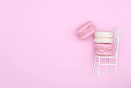 macarons on pink background, Beautiful dessert, Flat lay style with copy space to write.