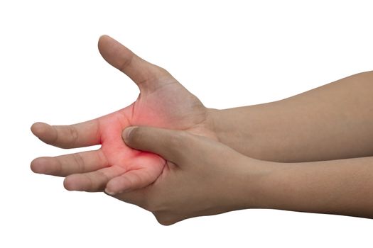 A woman massaging her painful hand isolated on a white background with red color on hand.