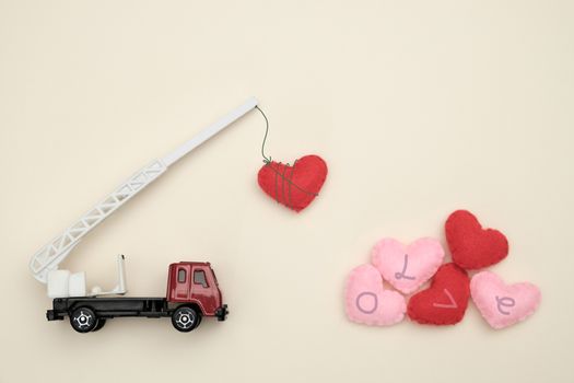 Cranes is lifting heart shape, valentine concept.