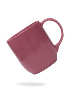 Pink ceramic mug or Coffee cup with shadow isolated on white background.