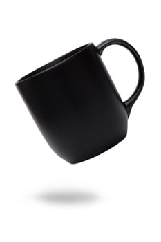 Black ceramic mug or Coffee cup with shadow isolated on white background.