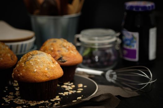 Still life blueberry muffins in a rustic style. Select the focus point.