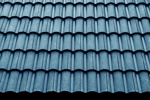Wet Blue Tiles Roof Pattern. Shot on Rainy Day. Details of Architecture Concept