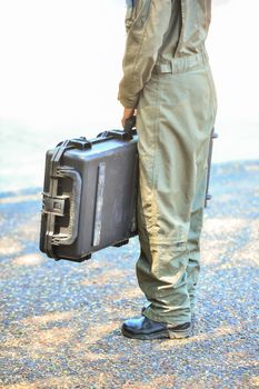 Explosive Ordnance Disposal's officer walking on the road to security check