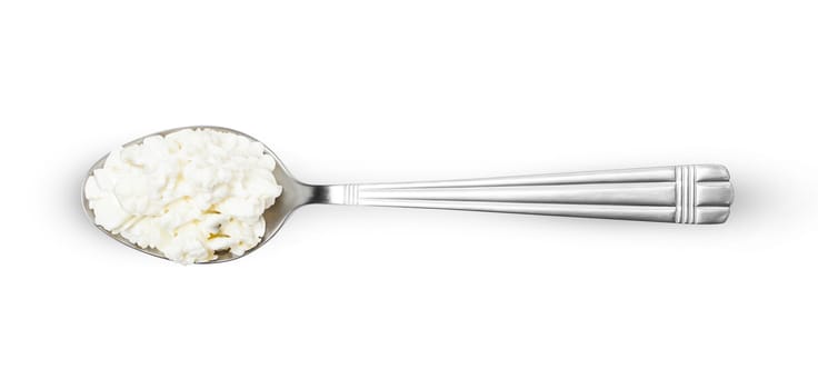 Cottage cheese in spoon isolated on white background with clipping path, view from the top