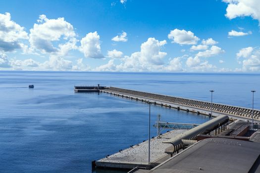 The Seawall in Malaga Spain out to the blue sea and sky