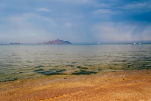 Overcast sky over the Red sea and Tiran Island