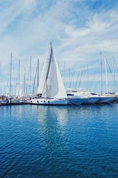 Yachts and boats in the harbor on Mediterranean sea coast, travel and leisure scene