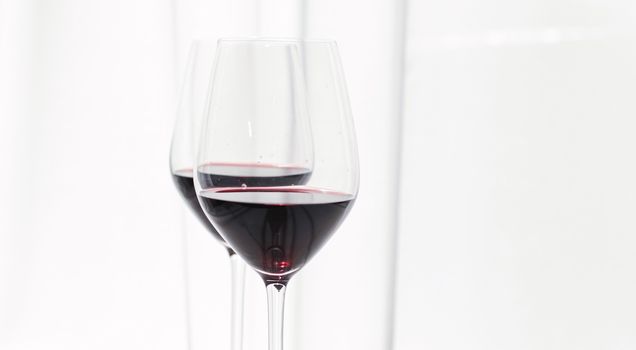 Two crystal glasses of red wine, organic beverage product