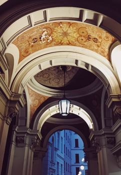 Exterior facade of classic building in the European city at night, architecture and design detail