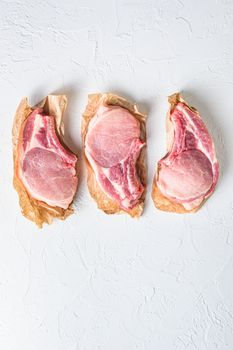 Fresh and raw organic pork meat. Top view space for text. Vertical