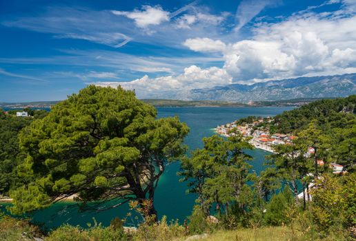 Colorful old village of Novigrad in Istria county of Croatia with blue river and harbor seen from the fortress