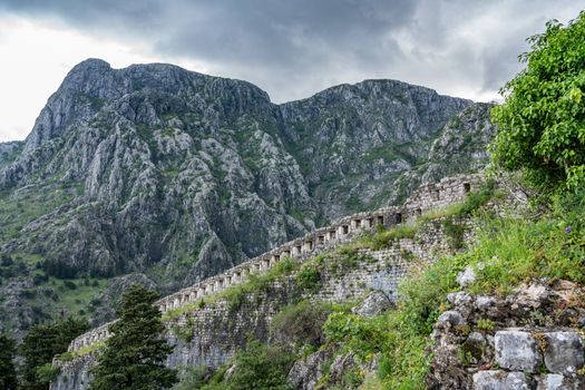 Stone walls of Kotor Fortress above the old town in Montenegro