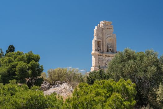 Monument of Filopappos above the trail on the summit of Filopappou Hill