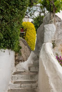 Narrow steps in ancient neighborhood of Anafiotika in Athens by the Acropolis