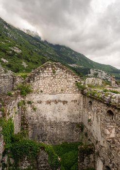 Stone walls of Kotor Fortress above the old town in Montenegro