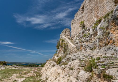 Steps leading to ruins of old Venetian fort above the coastal town of Novigrad in Croatia
