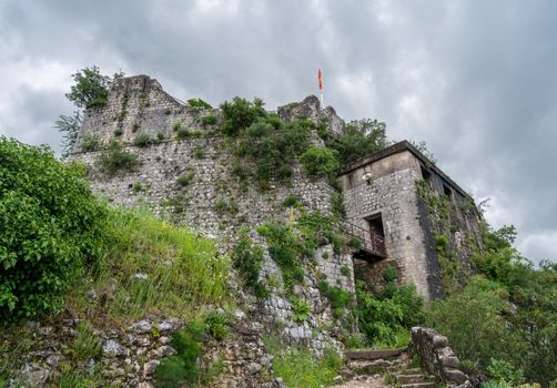 Stone walls of Kotor Fortress above the old town in Montenegro