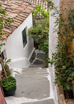 Narrow steps in ancient neighborhood of Anafiotika in Athens by the Acropolis