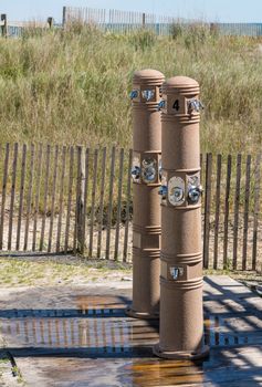 Two modern beach showers by the sand in Atlantic City on the New Jersey coast