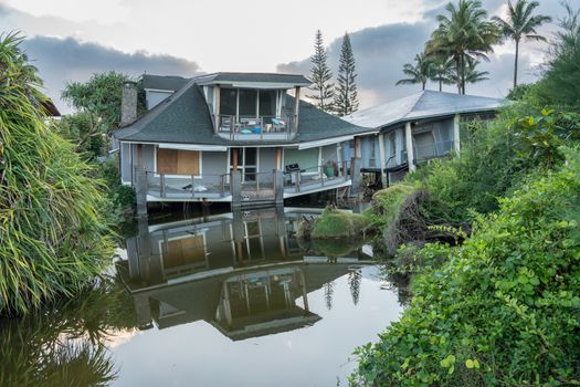 Two beach homes sinking into sink hole after the massive rain storms of April 2018 on Kauai
