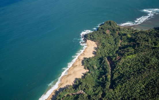 Aerial view of Hanalei Bay and Lumaha'i beach on hawaiian island of Kauai from helicopter flight