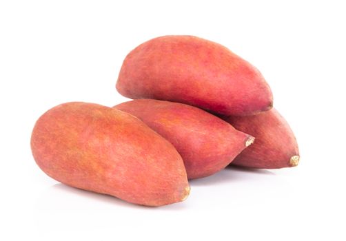 Raw sweet potato isolated on white background, healthy food concept