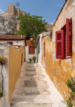 Narrow steps in ancient neighborhood of Anafiotika in Athens by the Acropolis