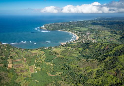 Aerial view of Hanalei Bay and Princeville on hawaiian island of Kauai from helicopter flight