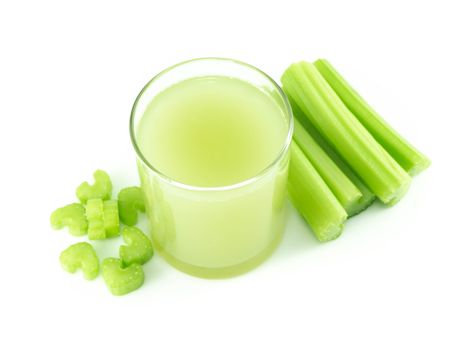 Glass of fresh celery juice isolated on white background, food for health