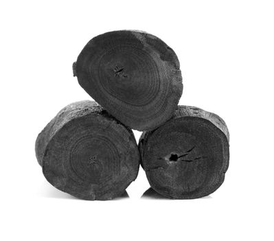 Natural black charcoal isolated on white background