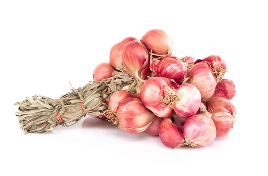 Red dried onions on white background, raw food ingredient